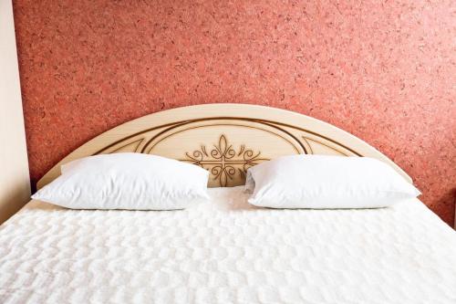Una cama o camas en una habitación de Laguna