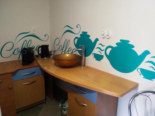 a kitchen with a table with a bowl on it at zielony zakątek in Nowy Targ