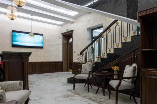 Televisyen dan/atau pusat hiburan di Aqua Hotel