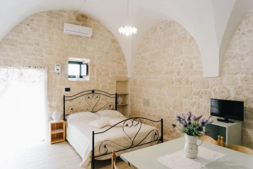 Ένα ή περισσότερα κρεβάτια σε δωμάτιο στο Casavita