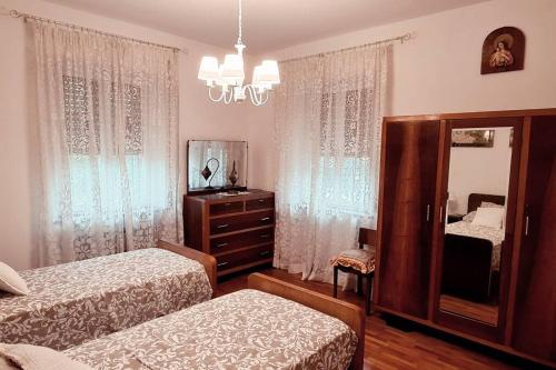 Casa degli Ulivi 19 tesisinde bir odada yatak veya yataklar
