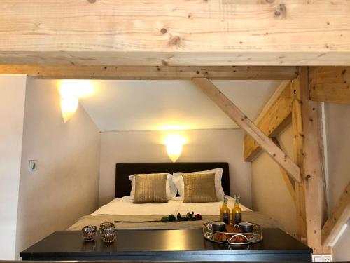 Ένα ή περισσότερα κρεβάτια σε δωμάτιο στο Magnifique LOFT Appartement Chalet Climatisé Buttes Chaumont