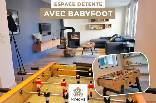 - un salon avec une table à jambe et un canapé dans l'établissement MyHome, à Bourg-en-Bresse