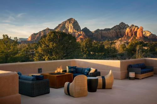 a living room with a view of the mountains at Sky Rock Sedona, a Tribute Portfolio Hotel in Sedona