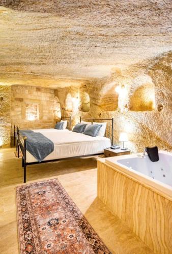 Uzay Cave Suite Hotelにあるベッド