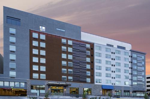 a rendering of a hotel with a building at SpringHill Suites by Marriott Colorado Springs Downtown in Colorado Springs