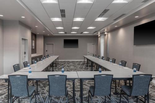 a large conference room with a long table and chairs at Residence Inn by Marriott Lancaster Palmdale in Lancaster