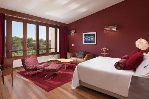 Un ou plusieurs lits dans un hébergement de l'établissement Hotel Marqués de Riscal, a Luxury Collection Hotel, Elciego
