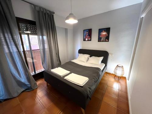 Postel nebo postele na pokoji v ubytování Apartamento Botero