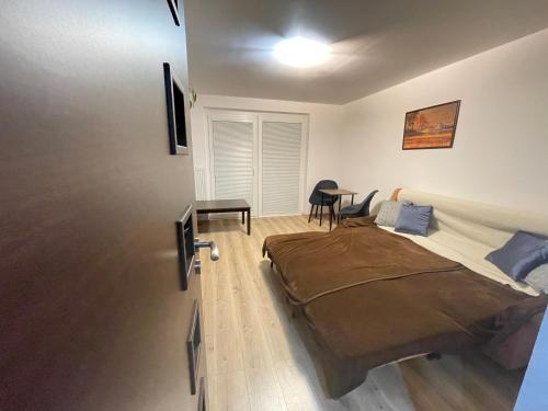 Postel nebo postele na pokoji v ubytování Apartman Bibi-D