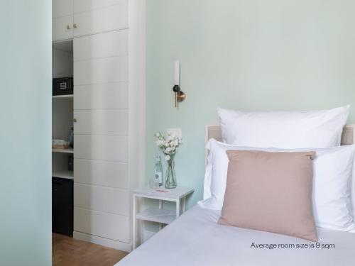 Cama o camas de una habitación en Numa Rome Portico