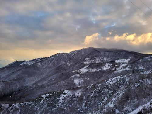 a view of a mountain with snow on it at Casa Ramaceto in Borzonasca