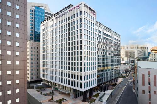 an overhead view of a tall building in a city at Le Méridien Seoul Myeongdong in Seoul