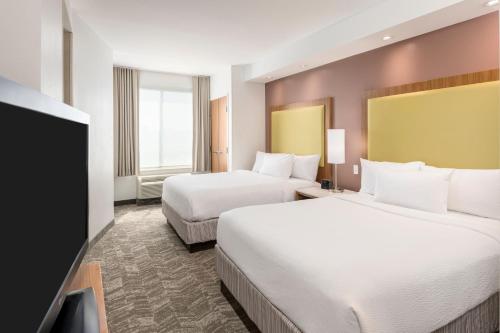 SpringHill Suites by Marriott Lafayette South at River Ranchにあるベッド