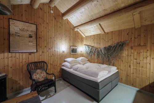 Reine Rorbuer - by Classic Norway Hotelsにあるベッド