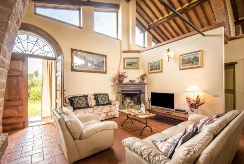 Χώρος καθιστικού στο Villa Il Fornacino