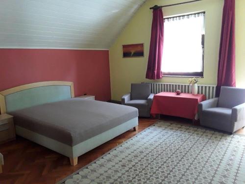 Un pat sau paturi într-o cameră la Villa Mariella