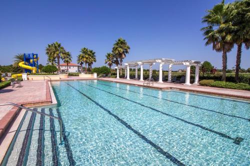Πισίνα στο ή κοντά στο South Facing Vacation Home - Providence Golf Resort - Pool & Spa - Game Room - Free Welcome Pack