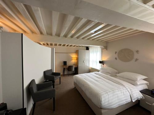 Postel nebo postele na pokoji v ubytování Hotel Grand Canal