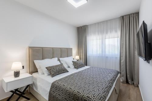 Postel nebo postele na pokoji v ubytování Luxury Apartments Katarina
