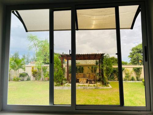 Zahrada ubytování Casa Conforto Bilene
