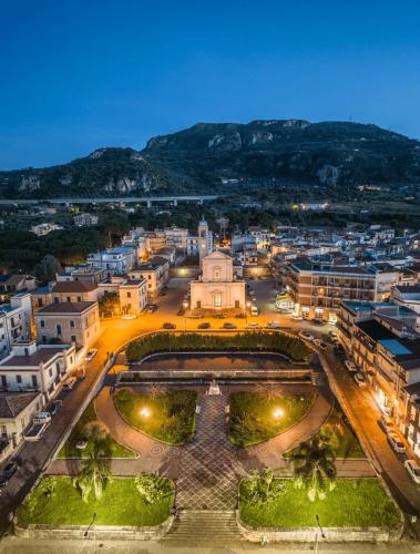 an aerial view of a city at night at Galì Holidays Casa Vacanze in Acquedolci