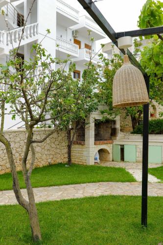 a street light in front of a building at Casa Del Mar in Ksamil