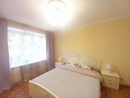 Voodi või voodid majutusasutuse ЦентрКомфорт 2х.комн.квартира toas