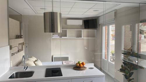Η κουζίνα ή μικρή κουζίνα στο Astorga suites