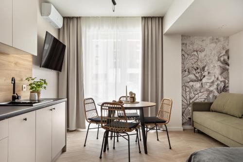 Μια τηλεόραση ή/και κέντρο ψυχαγωγίας στο Artis Apartments by Housine
