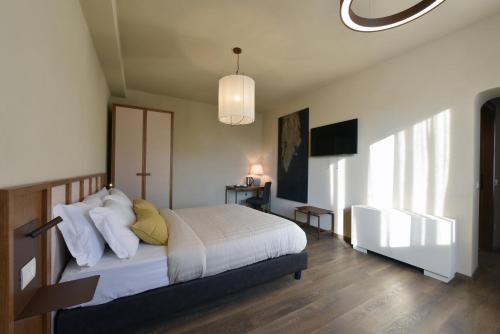 Cascina La Badiaにあるベッド