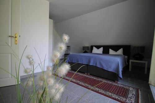 Postel nebo postele na pokoji v ubytování Schloß Wichmannsdorf