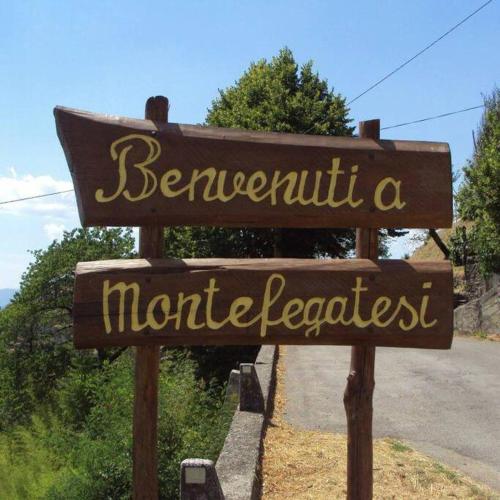 a sign for a natural preserve on a road at La Casetta in Montefegatesi