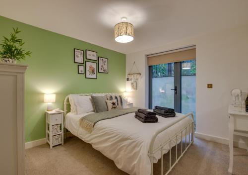 Postel nebo postele na pokoji v ubytování Pobbles Place