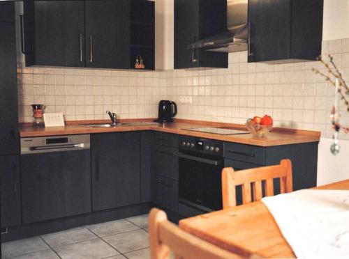 Η κουζίνα ή μικρή κουζίνα στο Apartment im Obstgarten