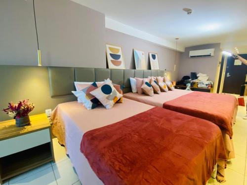 Katil atau katil-katil dalam bilik di Flat Beach Class Executive - Beira Mar de Boa Viagem