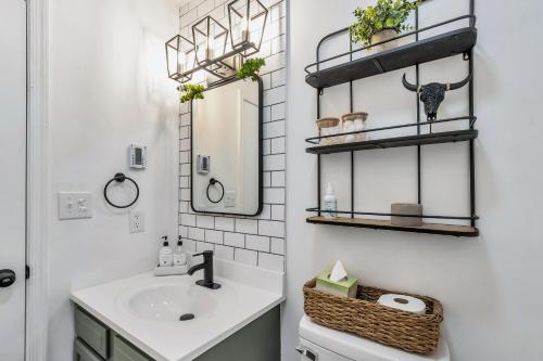 a bathroom with a sink and a mirror at Welcome to The Mountain Escape! in Albrightsville