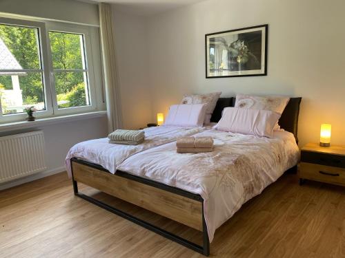 Llit o llits en una habitació de Ferienwohnung Blick ins Grüne