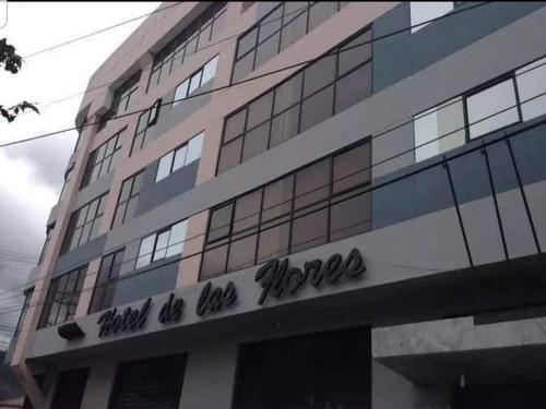 a building with the words finish the load zone on it at Hotel De Las Flores in Ambato