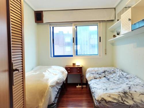 Кровать или кровати в номере Castro-urdiales Apartamento compartido o Apartamento entero