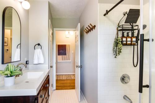 a bathroom with a sink and a shower at Asheville Home with Views Near Blue Ridge Parkway! in Asheville