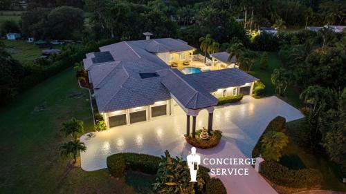 Vista aerea di 7 100 sf Mansion Estate on Over an Acre Heated Pool Jacuzzi Gameroom Movie Theater Playground 9 Bedroom & 7 Bath