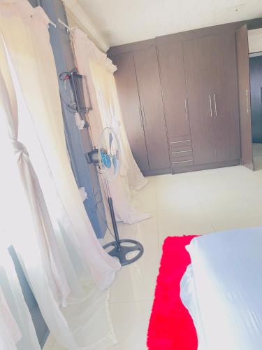 Ένα ή περισσότερα κρεβάτια σε δωμάτιο στο Galaxy Guest House Pretoria
