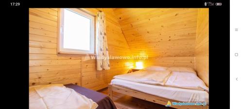 Llit o llits en una habitació de Domki SAMI