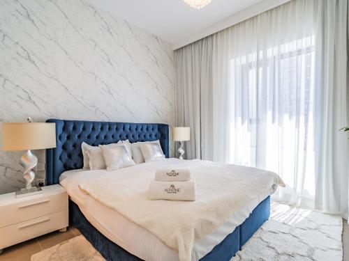 Postel nebo postele na pokoji v ubytování Fabulous 2BR in Park Heights 2 - Dubai Hills