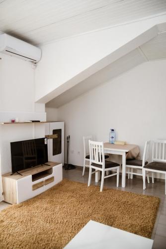 TV a/nebo společenská místnost v ubytování Iker apartments