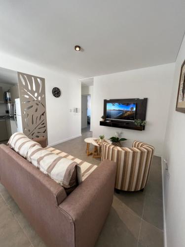 Un lugar para sentarse en Lumiere Apartments - Elegante Departamento en Complejo Residencial