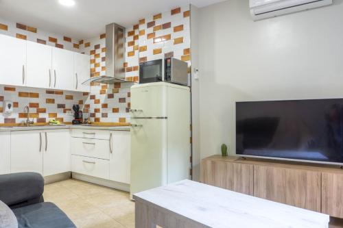 Kuchyňa alebo kuchynka v ubytovaní San Juan Apartment Málaga Center