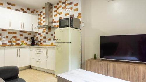 Kuchyňa alebo kuchynka v ubytovaní San Juan Apartment Málaga Center