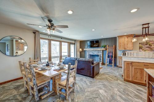 a kitchen and dining room with a table and chairs at Great Salida Getaway - 20 minutes to Monarch with Spa & Gameroom in Salida